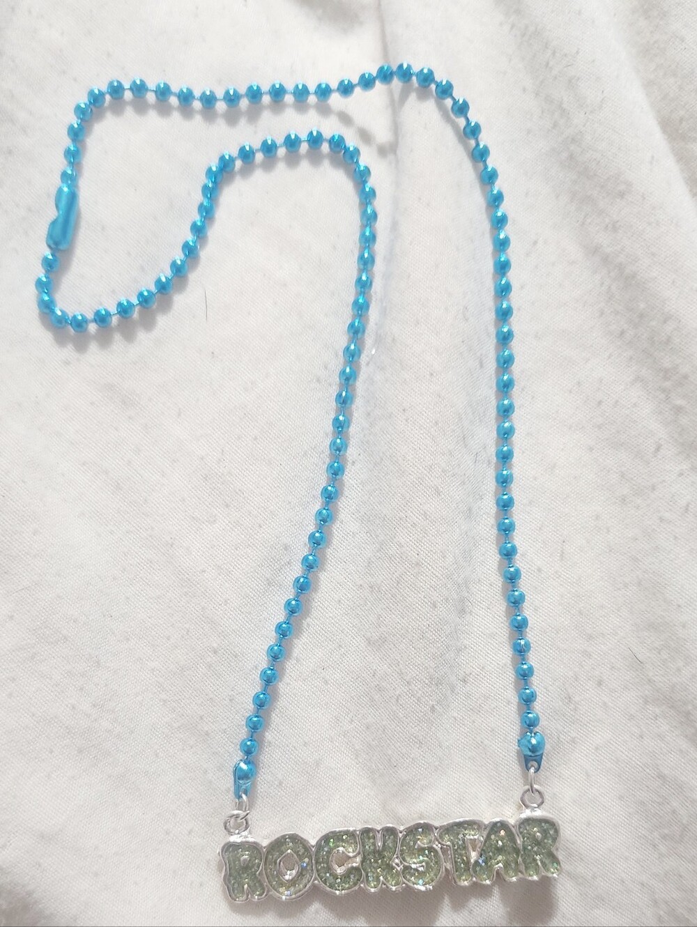 Source Unknown Blue Beaded "ROCKSTAR" Pendant Necklace